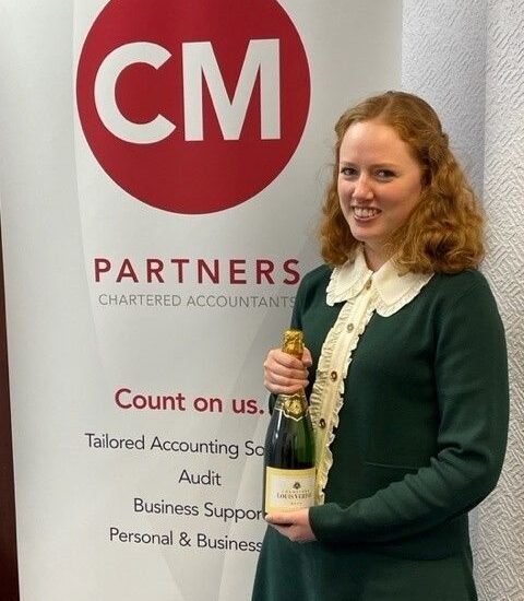 Emily with her well deserved celebration bottle!